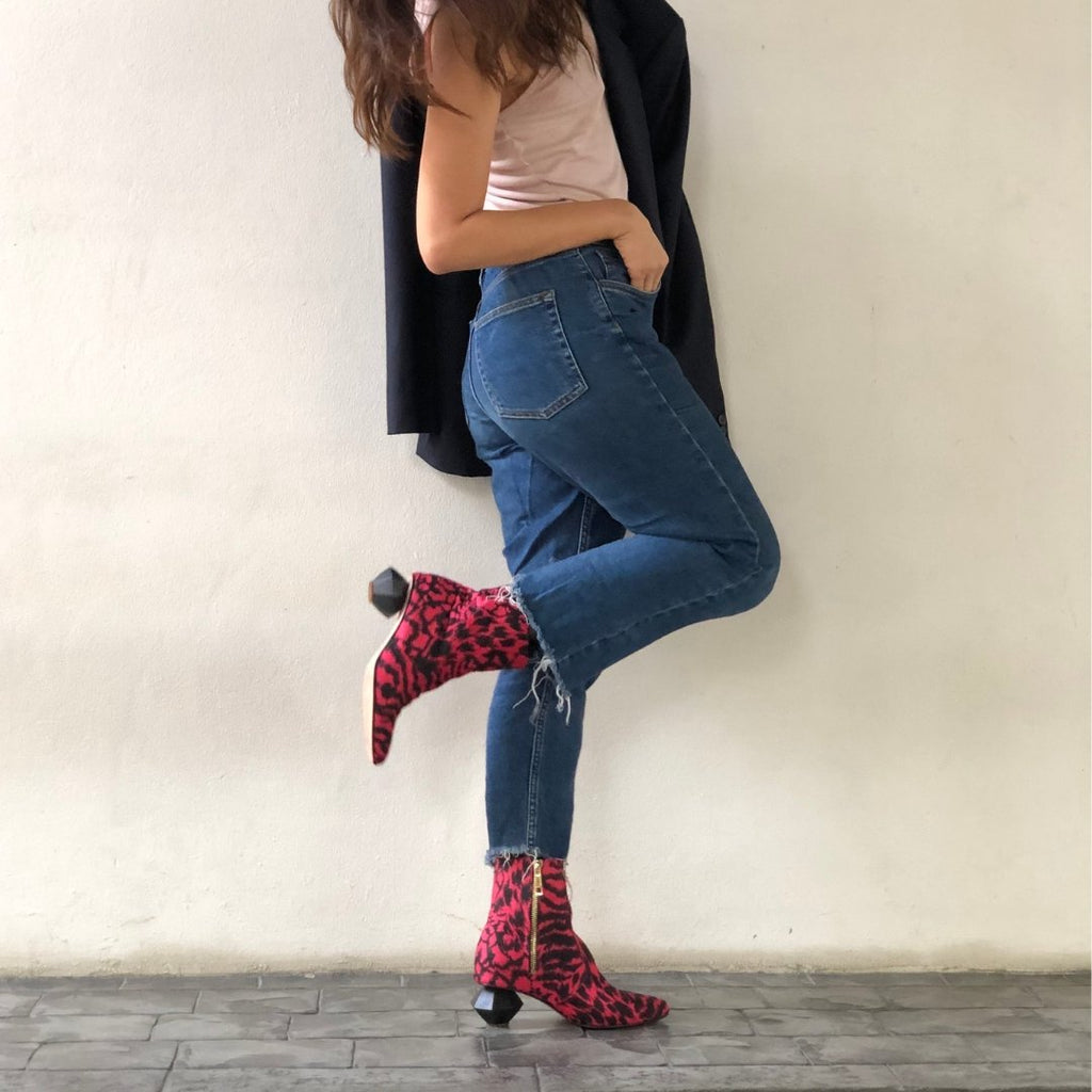 Sucette red leopard boots styled with jeans, t-shirt, and blazer