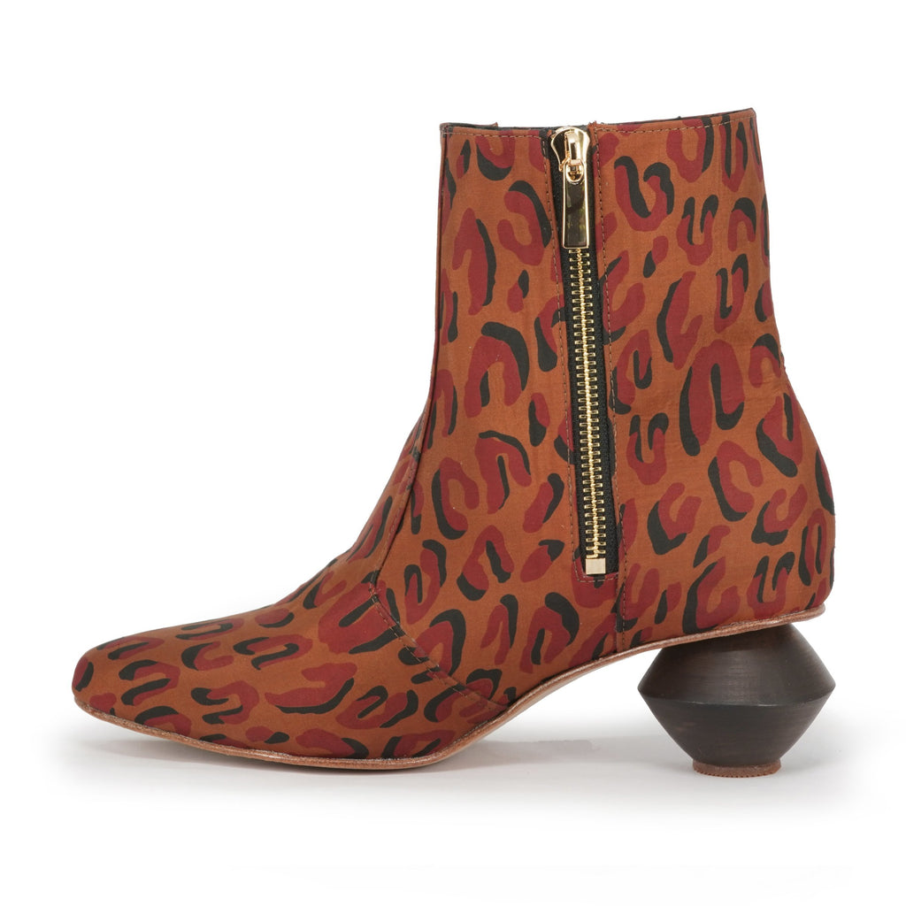 Leopard print silk boots with carved wood heel