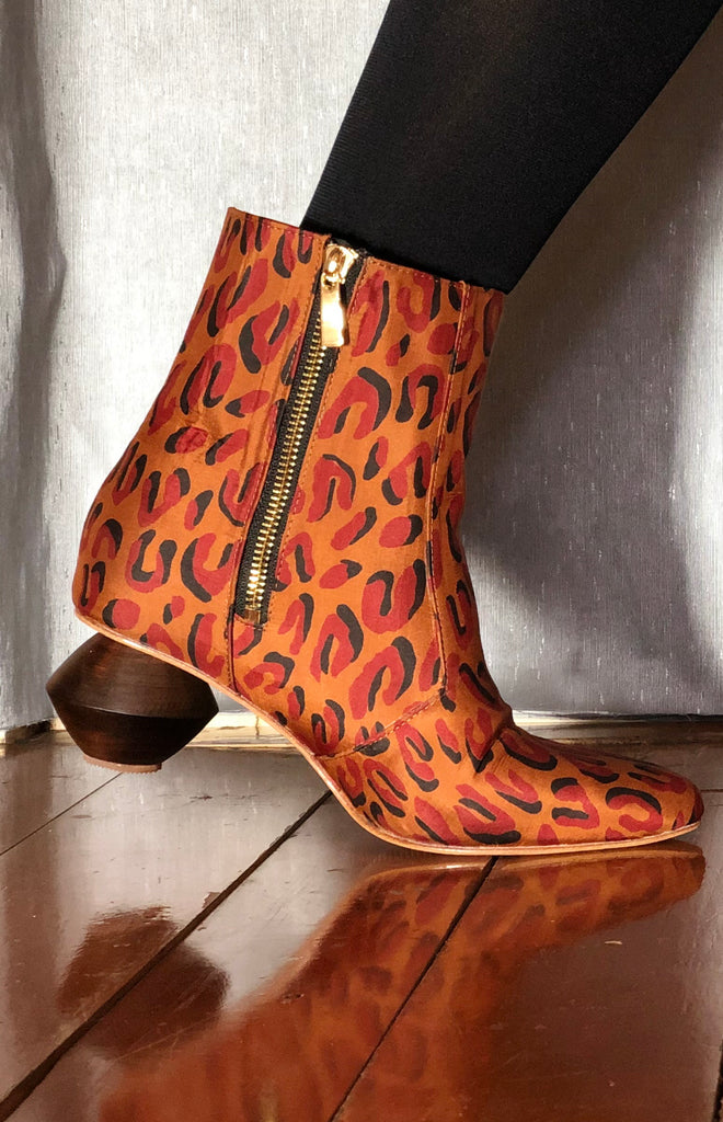 Dkny leopard shop print boots