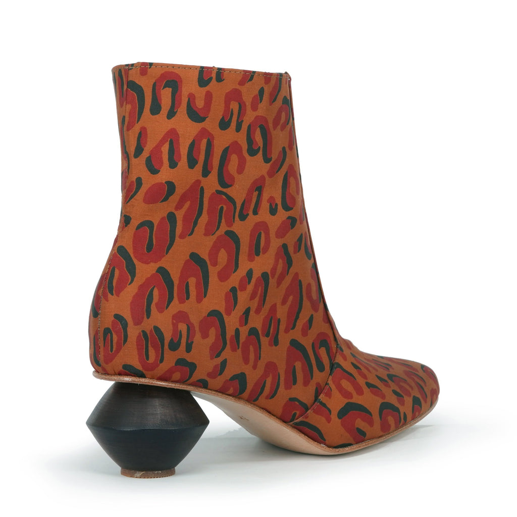 low heel leopard print ankle boot with sculpted heel