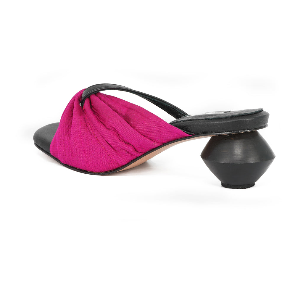 silk fuchsia mule sandals with sculptural heel by Sucette
